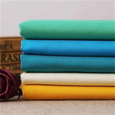La poplín de algodón es la tela de superficie tradicional.